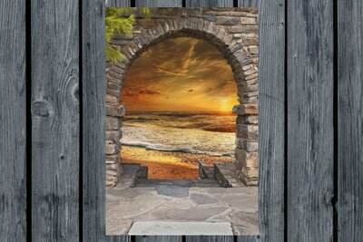 tuinposter doorkijk stenen muur - zonsondergang - zee - oranje zon - poster - tuinaccessoires - tuininrichting - souvenirs from the sea