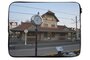 De Haan - Laptop cover - Macbook and Laptop sleeve - Laptop cover with photo of Tram station in De Haan aan Zee_